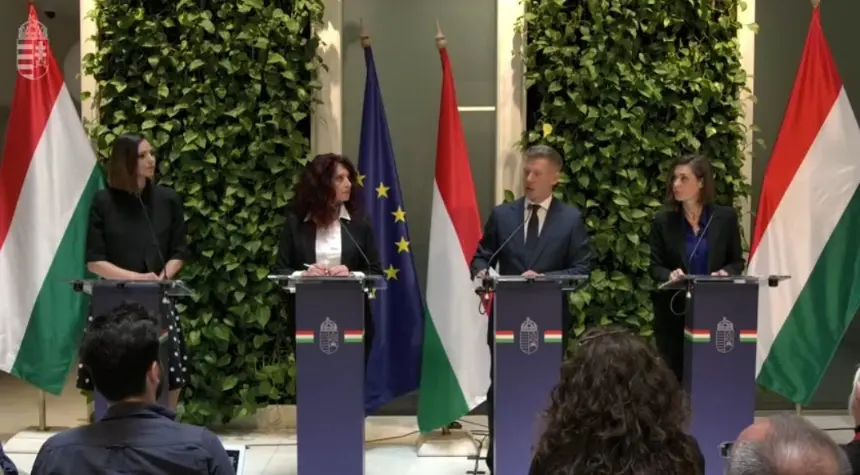 Hungary's officials speaking at a press conference.